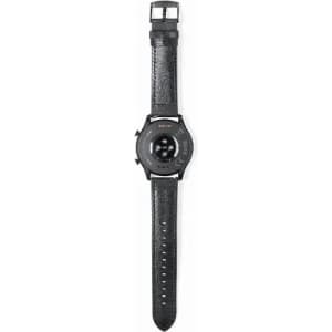 A black wristwatch with a round face and leather strap, featuring a logo on the back.