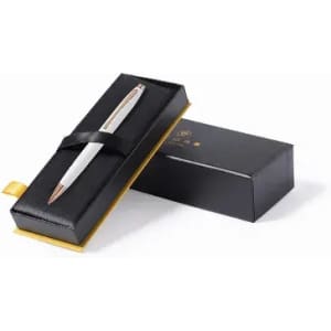 A pen in a sleek black box with gold accents. The pen is white with rose gold detailing.