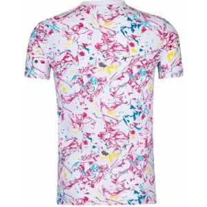 A t-shirt featuring a vibrant abstract pattern with pink, blue, yellow, and white hues, displaying a logo on the sleeve.