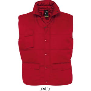 A red vest with multiple exterior pockets, featuring a high collar and button closures, with a logo present.