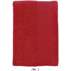 A large red bath towel measuring 150cm x 100cm, made of heavy weight 500gsm cotton, with a logo.