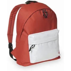 A backpack in red with a white front pocket, featuring adjustable straps and a loop for hanging.