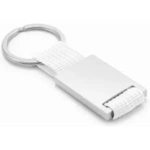 A keyring with a metal rectangular attachment and a white fabric strap. It features a circular metal loop.