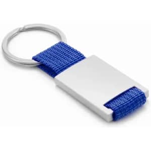 A keyring featuring a silver metal rectangular charm with a blue fabric strap.