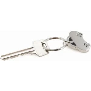 A key with a silver car-shaped keyring attached. The key has a traditional design.