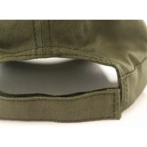 A green cap features a stitched band and an open back for ventilation. It includes a branding logo.