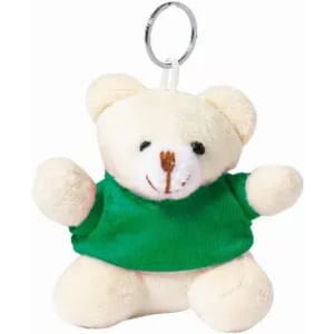 A small teddy bear keychain wearing a green shirt, featuring a cute smiling face and a metal keyring.