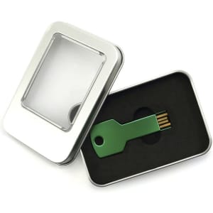 A green USB memory stick in the shape of a key, placed inside a silver tin box with a transparent lid.
