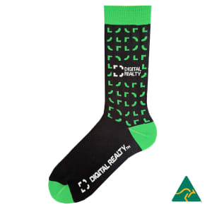 A pair of black socks with green accents and a logo, featuring a geometric pattern.