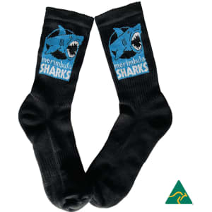A pair of black sports socks featuring a blue shark logo and design.
