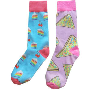A pair of colourful 3D printed dress socks featuring cake and rainbow patterns, with pink cuffs and contrasting designs.