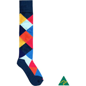 A vibrant cotton knee-high sock featuring a multicoloured diamond pattern on a navy background, with a logo at the bottom.