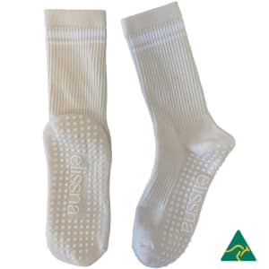 Crew Grip socks in cream with textured grips on the soles, featuring a logo on the side.
