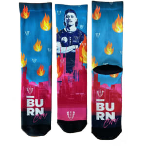 Sublimated socks featuring a blue background with flames and a bold graphic design in vibrant colours.