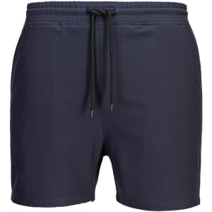 Dark navy quick-dry sports shorts with an elastic waistband and drawstring. Features a logo on the design.