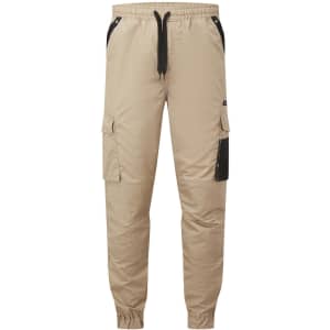 Beige lightweight pants with cargo pockets and an elastic waistband, featuring a logo on the side.