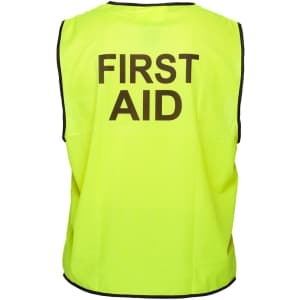 A hi-vis yellow vest with "FIRST AID" printed on the back, featuring black trim.