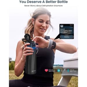 A drink bottle in dark grey with a digital display, featuring a flip-top lid and a logo.