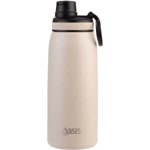 A drink bottle in a light beige colour with a black screw cap and a logo. Features a sleek, vacuum-insulated design.