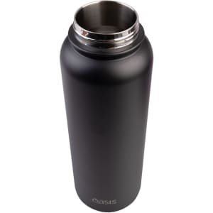 A drink bottle in matte black with a stainless steel neck and a logo, featuring a vacuum quick release cap.
