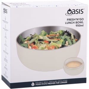 A large, insulated lunch bowl in pale cream with a grey lid, featuring a logo on the packaging.