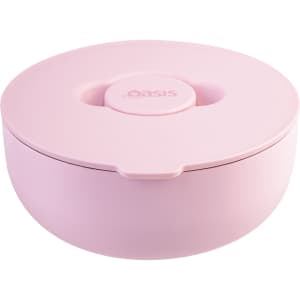 A pink insulated lunch bowl with a lid, featuring a circular design and a logo on the top.