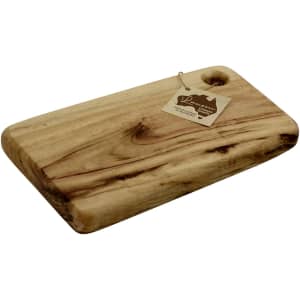 A rectangular cheese board made from light-coloured wood with a smooth finish and a hole for hanging.
