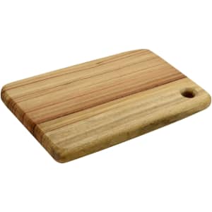 A wooden cheese board with a natural finish, featuring stripes and a rounded corner with a hole.