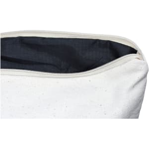 A white toiletry/makeup bag with a zippered top, featuring a black interior lining and speckled texture.