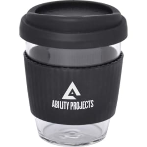 A drink bottle featuring a transparent body, black silicone band, and lid, branded with a logo.