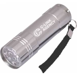 A silver mini torch featuring multiple LED lights, a keyring attachment, and a textured grip. It has a branding logo.