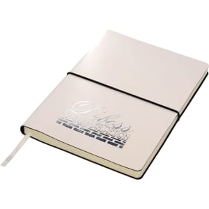 A white A5 notebook with a black elastic band and a logo printed on the cover. It has a ribbon bookmark inside.