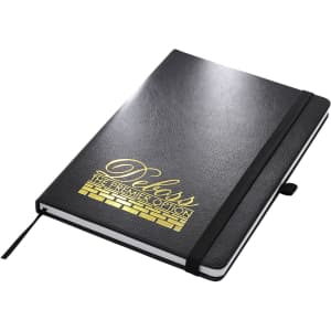 A black A5 notebook with a textured cover, featuring a gold logo on the front and an elastic closure.