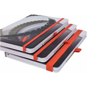 A stack of three A5 notebooks with full colour matte covers, featuring orange elastic closures.