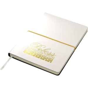 A white A5 notepad with a yellow elastic band and gold branding on the cover.