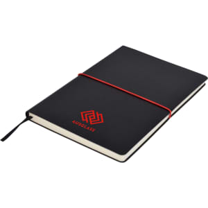 A black A5 notepad with a red elastic band, featuring a logo on the cover.