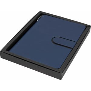 A navy A5 notebook in a black cardboard box, featuring a simple flap closure and a branding logo.