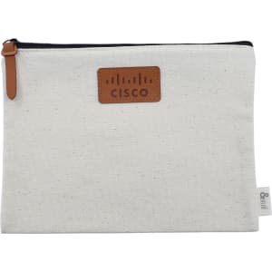 A cream-coloured conference bag with a leather label. It features a zip closure and has a logo on the front.