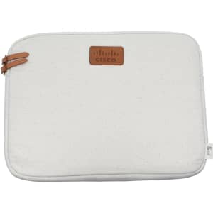 A white laptop sleeve with a leather patch and branding, featuring a simple and modern design.