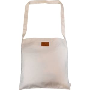 A neutral-coloured tote bag with a long handle and a logo tag. The dimensions are 38x38cm.