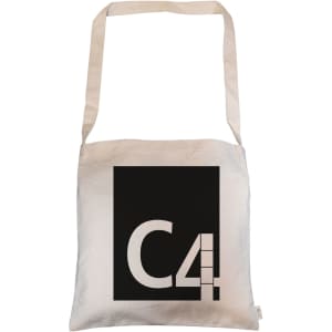 A cream tote bag with long handles featuring a black square design and a logo.