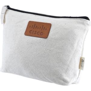 A cream toiletry or makeup bag with a leather-like patch and a zipper closure, featuring a logo.