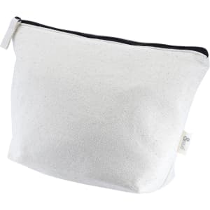 A cream toiletry/makeup bag with a zip closure, featuring a branding tag on the side.