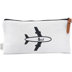 A white toiletry pouch with a black airplane design and a brown zip pull. It features a logo on one side.