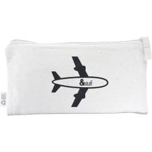 A cream toiletry pouch featuring a black airplane graphic and a logo, with a zip closure.