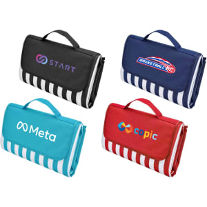 Four picnic rugs are displayed, featuring various logos and colour combinations, primarily in navy, red, and black.