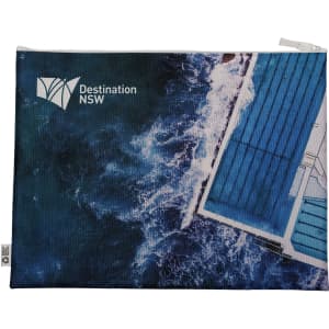 A blue conference bag featuring a water and pool design, with a logo in the corner.