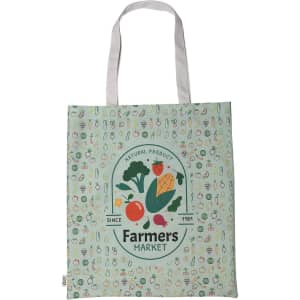 A green tote bag featuring a farm-themed design and a logo, with white straps and illustrations of fruits and vegetables.