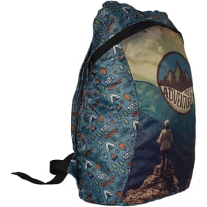 A fold-up backpack featuring a blue pattern with adventure-themed graphics and a large landscape print on one side.