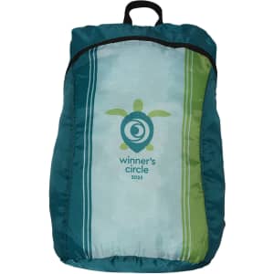 A fold-up backpack in teal and green with a logo on the front.